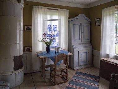 Interior of the decorated farmhouse of Forsa in Frano, Halsingland, Sweden in the summer 2018 clipart