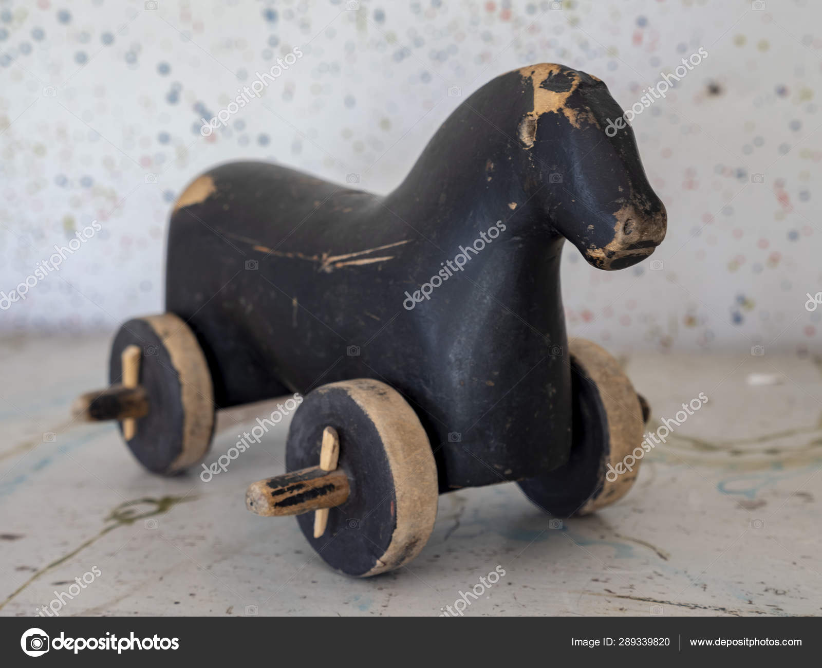wooden horse on wheels
