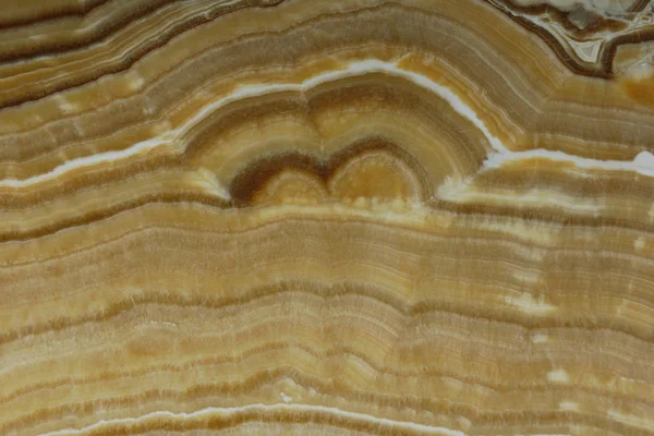 Pedra natural Onyx cor amarelo-marrom com um belo padrão — Fotografia de Stock