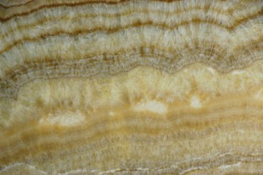 Doğal taş Onyx, yatay arka plan bir yuvarlak lekeler