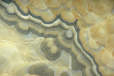 A beautiful background of natural stone, called onix naranja veteado.