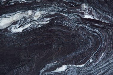 Kuvarsit Rosso Luana denir karanlık bir doğal taş çarpıcı ışık desen