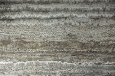 Doğal taş Traverten gri-bej ve paralel çizgiler Travertino titanyum denir