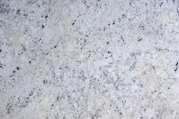 Background natural white stone with black dots, called granite Fantastic White — Stock Photo, Image