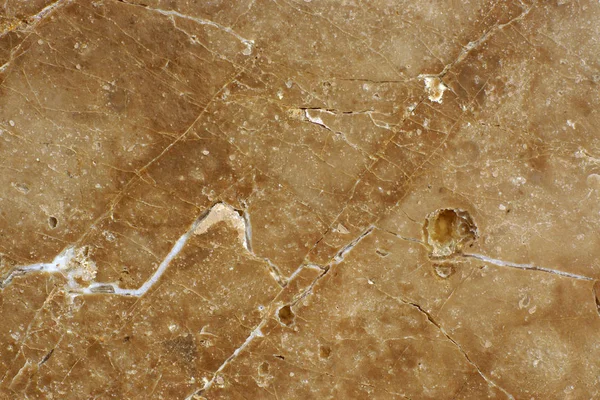 Фон из натурального мраморного камня коричневый с белыми полосами и трещинами — стоковое фото