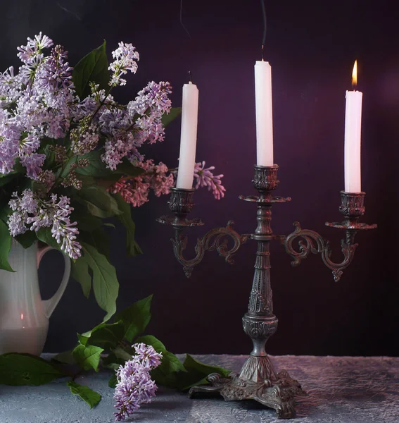 Extinguished Candles Table Next Bouquet Lilacs White Jug — Stock Photo, Image