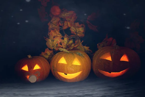 Halloween pumpkins with glowing eyes on a dark background with autumn leaves.