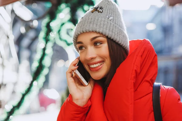 Happy Beautiful Girl Knitted Hat Red Winter Coat Outdoors Using — Stock Photo, Image