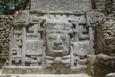 Close Up of Mask at Mask Temple, Lamanai Archaeological Reserve, Orange Walk, Belize, Central America. clipart