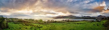 Panoramic view of bay near the ocean in Cloghane clipart