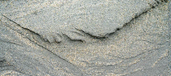 Superfície de areia cinza para um fundo ou textura — Fotografia de Stock