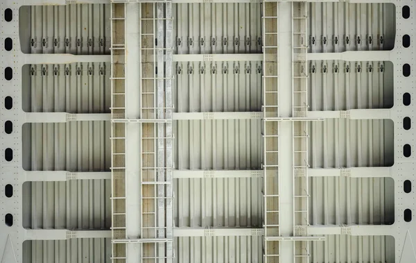 Steel beams on a road bridge with steel plates and riveted joints. Texture background.