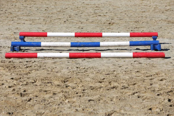 Various colorful obstacles for equestrian training — Stock Photo, Image