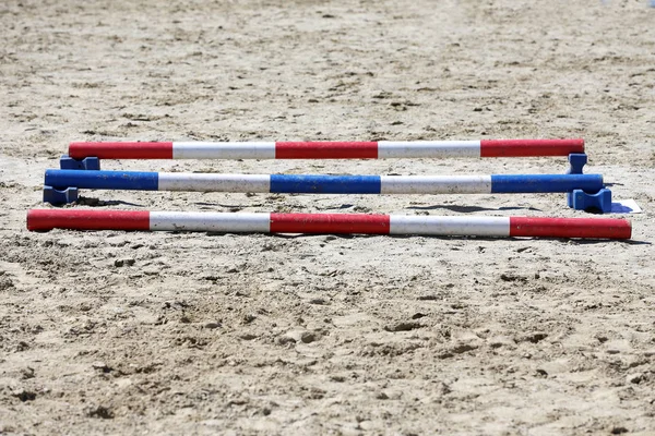 Various colorful obstacles for equestrian training — Stock Photo, Image