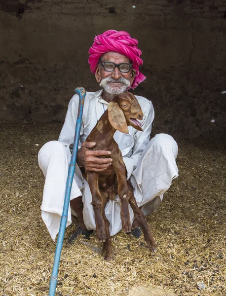 Old Indian rural Man portrait from village of rajasthan-india,