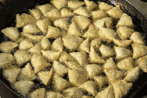 Indian traditional Street Food Samosa, Samosa Made of Fine wheat Flour, Potato, pea, and indian spices