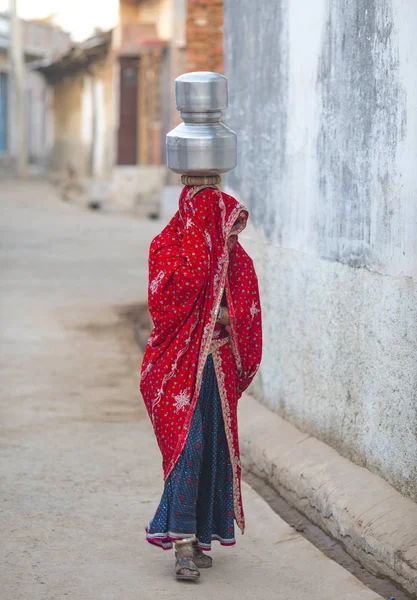 Rural girl Carry water
