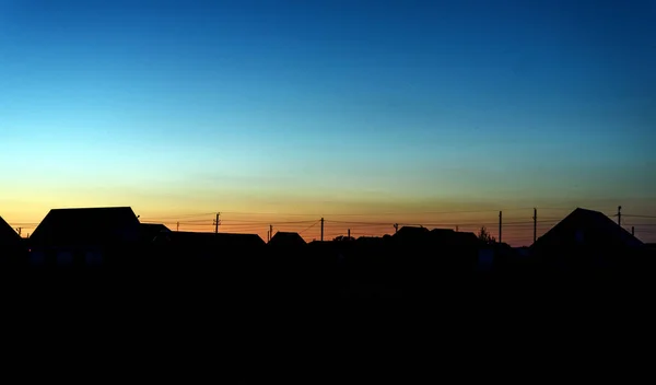 Rural Village in Silhouette at Dusk — Stock Photo, Image