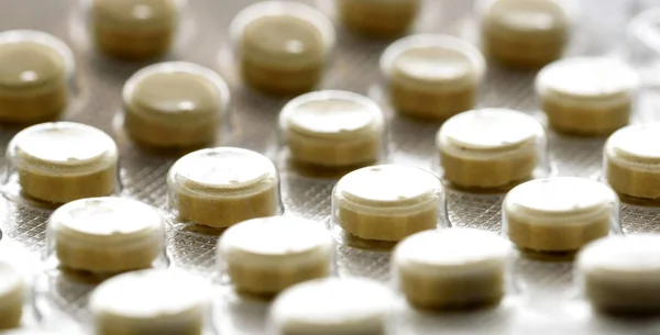 Primer plano de las píldoras médicas desconocidas selladas —  Fotos de Stock