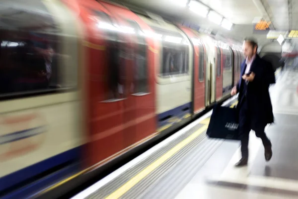 Blurred Commuters Using London Underground Train — Stock Photo, Image