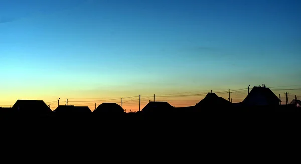 Rural Village in Silhouette at Dusk — Stock Photo, Image