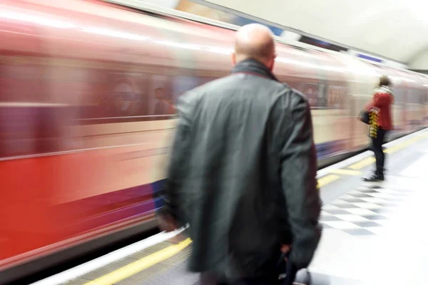 Blurred Commuters Using London Underground Train — Stock Photo, Image