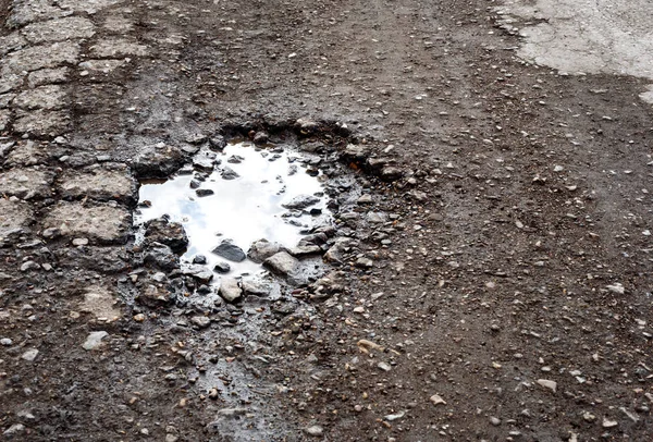 Water Filled Pothole in the Road — Stock Photo, Image