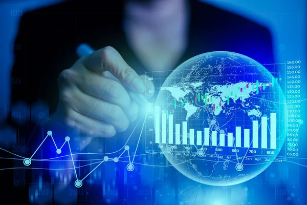 Business Financial Trading Investment concept. Businesswomen use a pen to write information with stock market graph data. Hand drawing increasing graph on signal network coverage around the world.