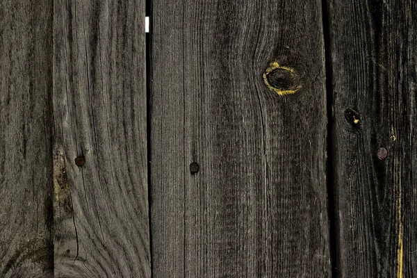 Textura de madeira velha desbotada com um nó. Contexto abstrato . — Fotografia de Stock