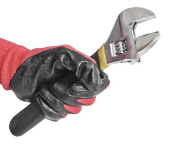 Ayarlanabilir anahtarı kırmızı bir çalışma eldiven bir adamın elinde. Anahtar Kilit Hizmetleri aracı.