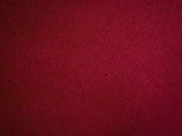 Texture of dark red cardboard closeup, abstract paper background — Stock Photo, Image