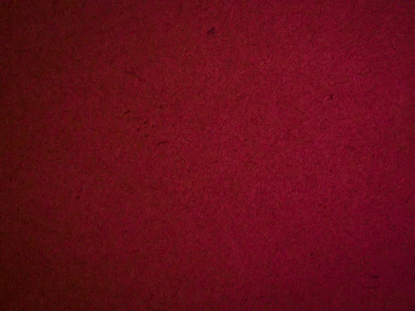 Koyu kırmızı karton closeup, soyut kağıt arka plan dokusu — Stok fotoğraf