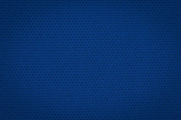 Texture of a real dark blue knit. Fabric background.