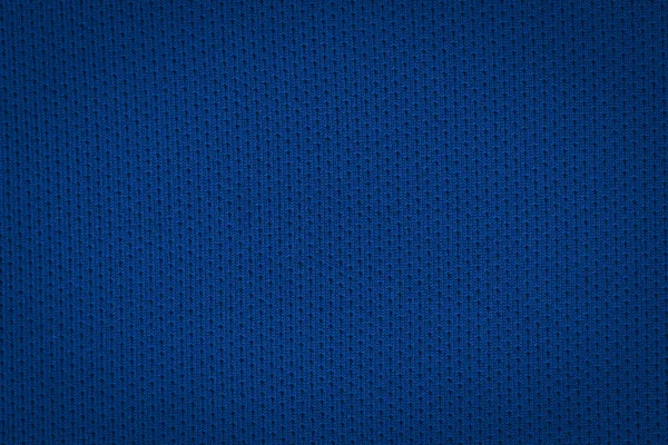 Texture of a real dark blue knit. Fabric background.