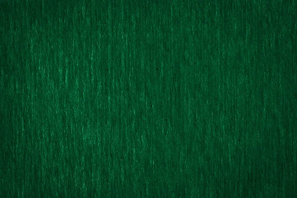 Textura abstrata de um fundo de papel verde escuro áspero — Fotografia de Stock