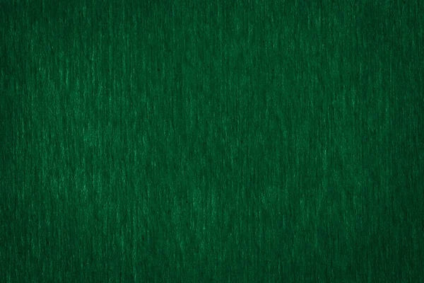 Textura abstrata de um fundo de papel verde escuro áspero — Fotografia de Stock