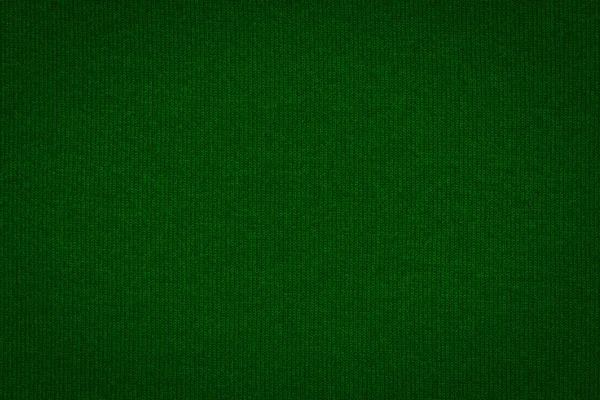 Текстура настоящего темно-зеленого трикотажа, текстильный фон . — стоковое фото