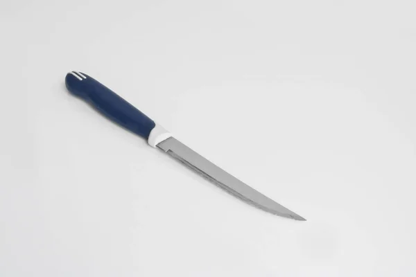 Przybory Kuchenne Uniwersalny Nóż Piłą Jasnym Tle Narzędzia Gotowania — Zdjęcie stockowe