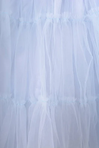 Fundo de textura tecido azul. A saia é feita de tule — Fotografia de Stock