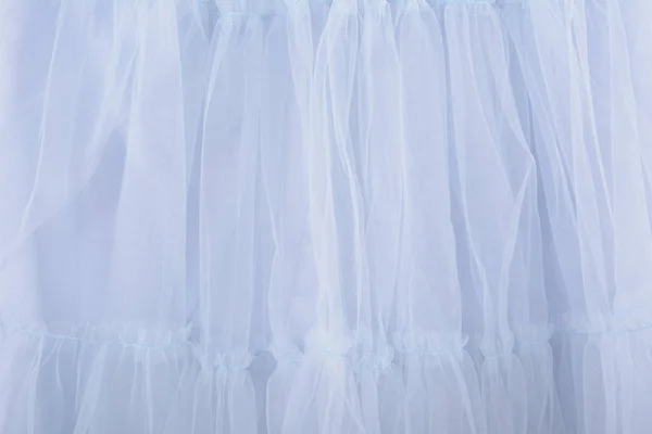 Fundo de textura tecido azul. A saia é feita de tule — Fotografia de Stock