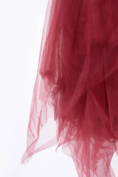 Saia vermelha feita de tule no branco — Fotografia de Stock