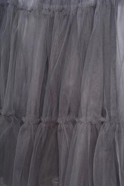 Fundo de textura de tecido cinza. A saia é feita de tule — Fotografia de Stock