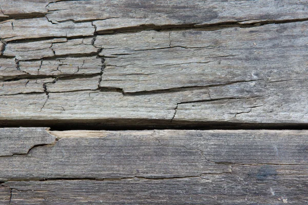 Tekstura starej szarej popękanej planszy — Zdjęcie stockowe