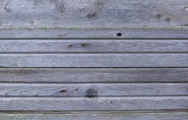 Konsistensen på den gamla grå spruckna styrelsen — Stockfoto