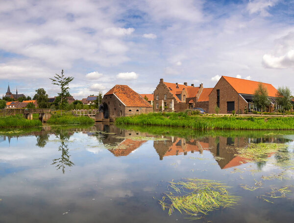 Watermill the Friedesse Molen in Neer along the Neerbeek river in the Dutch village Neer in the province Limburg