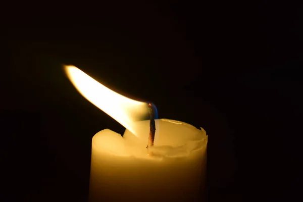 Candle Light flame close up With black background