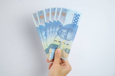 Kadın Tutma ve Gösterme 50.000 Endonezya Rupia Parası