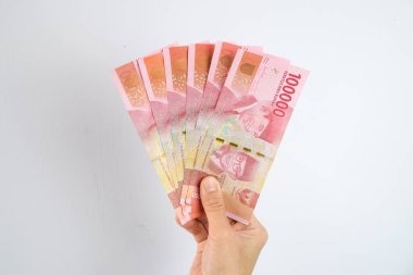 Kadın Tutma ve Gösterme 100.000 Endonezya Rupia Parası