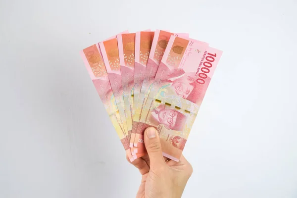 Woman Holding Och Visar 100 000 Indonesiska Rupiah Pengar — Stockfoto