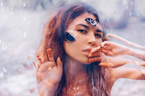 Beautiful young woman with butterfly. double exposure — Stock Photo, Image